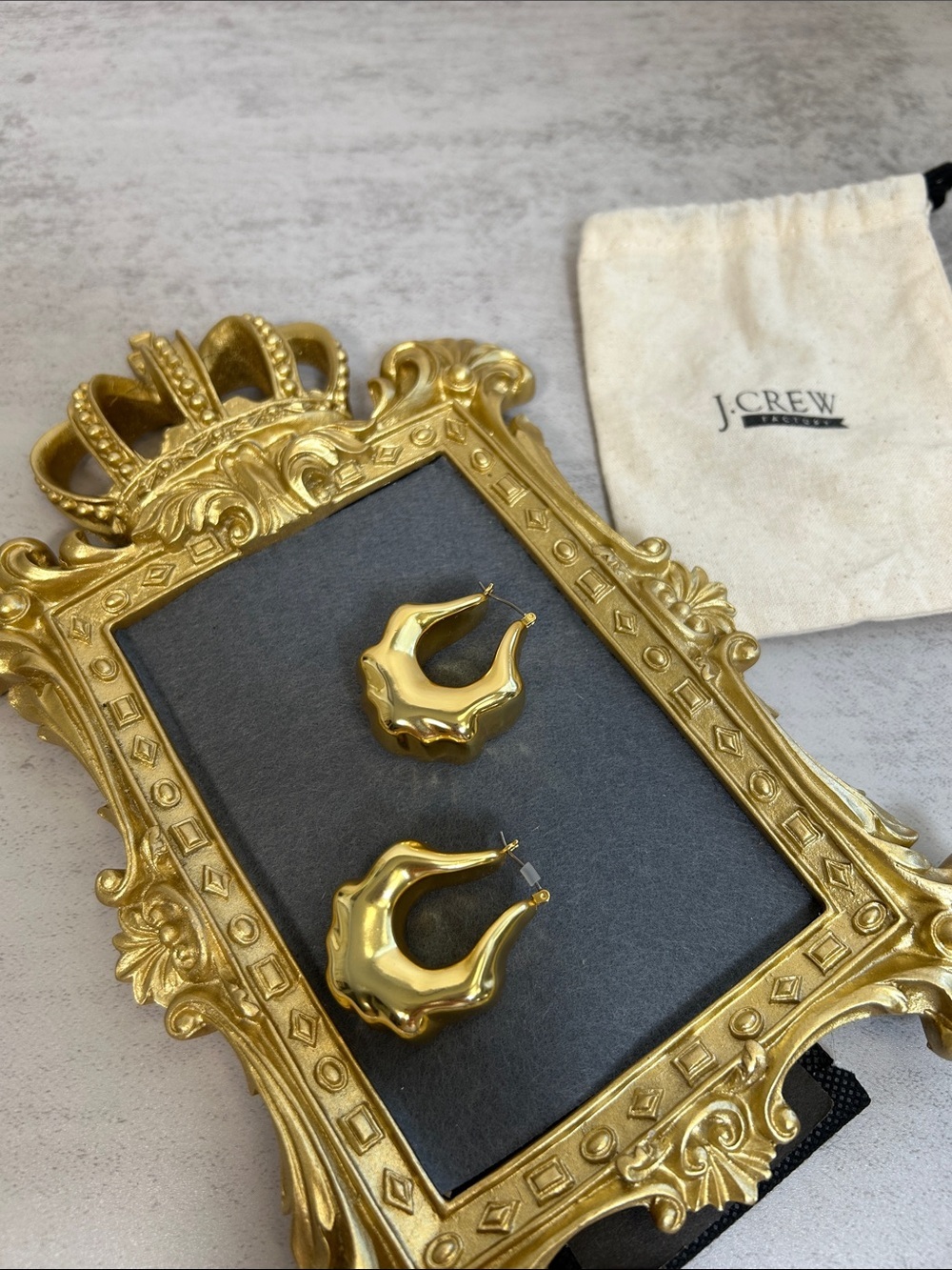 J. Crew Shiny Gold Sculpted Hoop Earrings comes with dust bag